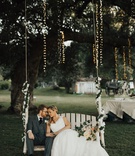 Newlyweds on Bench Swing
Photography: Heirlume Photography
Read More:
http://www.insideweddings.com/weddings/elegant-personalized-wedding-with-adventure-motif-in-malibu/1308/ bride and groom leaning against each other on swinging hanging wrapped in vines hanging from tree