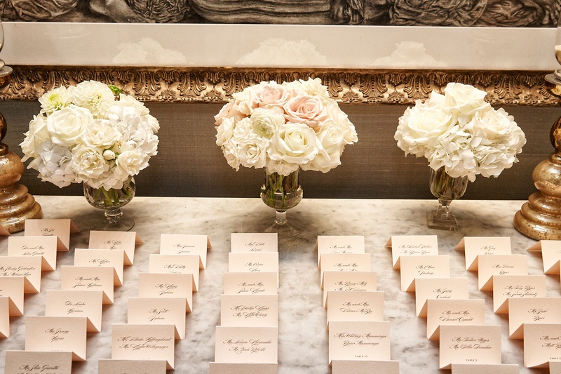 Calligraphed Escort Cards with Bouquets
Photography: KingenSmith
Read More:
http://www.insideweddings.com/weddings/catholic-ceremony-soft-romantic-fairy-tale-reception-in-chicago/754/ beige place cards with black calligraphy and cream and blush bouquets