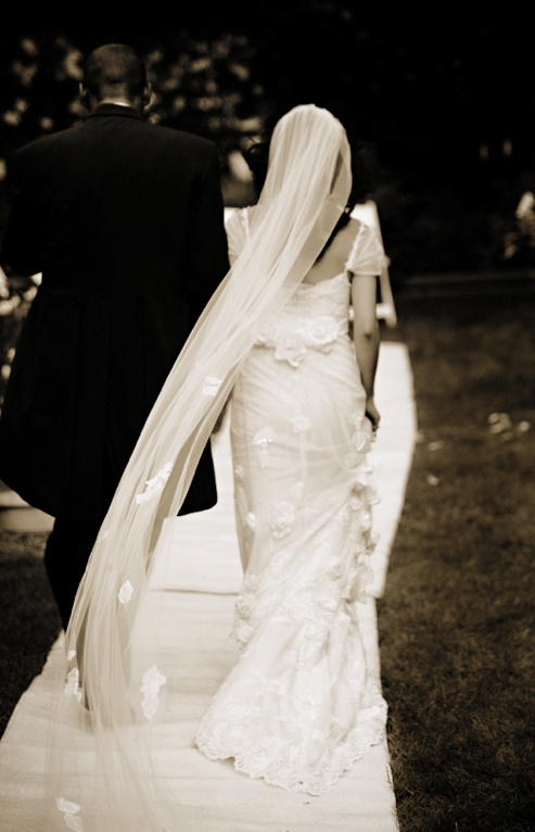 Bride and Groom
Photography: Chris + Lynn Photographers
Read More:
http://www.insideweddings.com/weddings/butterfly-inspired-spring-wedding-in-canada/189/ Sepia photo of bride in a Claire Pettibone lace gown and groom in black tails exit the ceremony