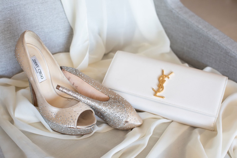 Designer Shoes %26 Bridal Clutch
Photography: Collin Pierson Photography
Read More:
http://www.insideweddings.com/weddings/beach-wedding-ceremony-romantic-reception-inspiration-in-cabo/1304/ wedding accessories jimmy choo peep toe metallic glitter pumps yves saint laurent ysl white bag
