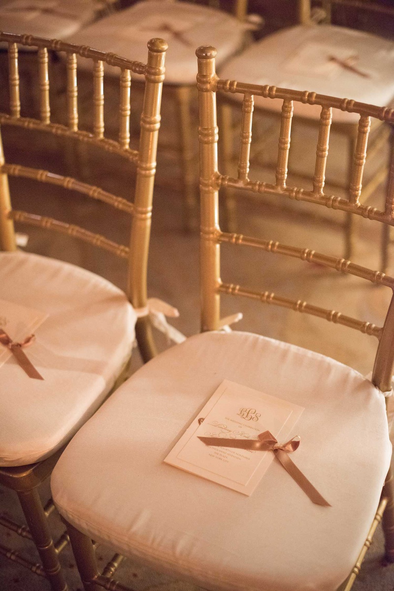 Gold Chairs %26 Ceremony Program
Photography: The Day by Ira Lippke
Read More:
http://www.insideweddings.com/weddings/opulent-luxury-wedding-with-timeless-color-palette-in-new-york-city/1199/ wedding ceremony gold chairs white cushions monogram ceremony program gold ribbon