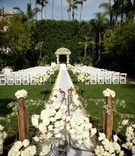 All-White Garden Ceremony
Photography: John Solano Photography
Read More:
http://www.insideweddings.com/weddings/modern-indian-wedding-in-beverly-hills-california/337/ Floral-embellished gate and wedding canopy