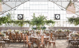Industrial Chairs at Greenhouse Venue
Photography: Maya Myers Photography
Read More:
http://www.insideweddings.com/weddings/ocean-view-ceremony-rustic-chic-reception-in-former-greenhouse/1297/ wedding reception greenhouse venue tall greenery trees industrial copper chairs high low centerpiece