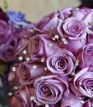 Crystal Lavender Bouquet
Photography: KingenSmith
Read More:
http://www.insideweddings.com/weddings/interfaith-candlelit-ceremony-glamour-purple-reception/370/ Wedding bouquet with purple roses and dotted crystals