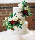 Semi-Naked Cake with Winter Florals
Photography: Carrie King Photography
Read More:
http://www.insideweddings.com/weddings/chic-winter-wedding-at-a-church-industrial-artsy-venue-in-denver/1289/ wedding reception brick wall cake stand white three layer cake with greenery white rose red flower