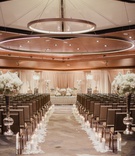 Ballroom Persian Wedding Ceremony
Photography: Shaun Menary Photography
Read More:
http://www.insideweddings.com/weddings/multicultural-wedding-with-a-winter-wonderland-theme-in-dallas/1126/ Ballroom wedding ceremony persian wedding with round lights overhead square chairs white flowers
