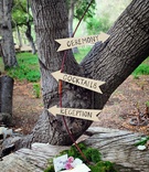 Bow %26 Arrow Direction Signs
Photography: Lucky Love Photography
Read More:
http://www.insideweddings.com/weddings/rustic-inspirational-wedding-shoot-in-a-forest-with-woodsy-details/661/ Outdoor wedding with direction signs made of arrow cutouts placed on a bow
