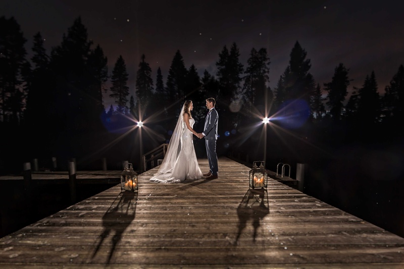 Couple on Dock at Nighttime
Photography: Sallee Photography
Read More:
http://www.insideweddings.com/weddings/rustic-chic-lakeside-wedding-with-geometric-details-in-california/843/ couple on dock night dusk small lights darkened background lake tahoe california