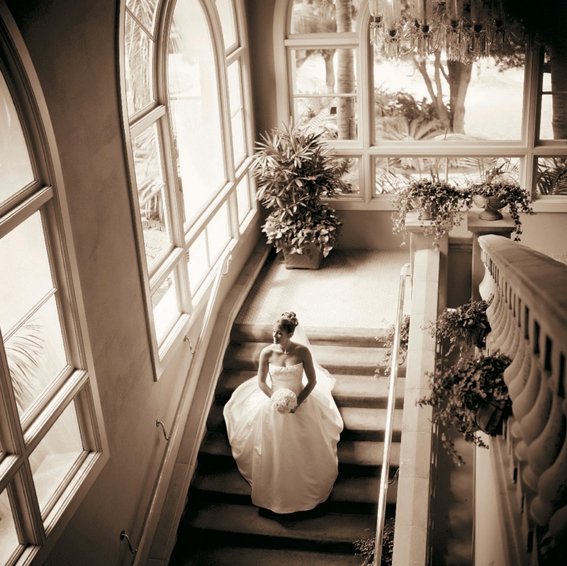 Bride Going Down Stairs
Photography: Tony Florez Photography
Read More:
http://www.insideweddings.com/weddings/grand-ballroom-wedding-at-the-ritz-carlton-in-southern-california/97/ Sepia tone picture of bride walking down stairs