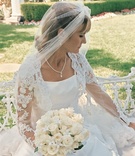 Bride Wearing Lace Bolero and Veil
Photography: Silvia Mautner Photography
Read More:
http://www.insideweddings.com/weddings/red-rose-inspired-backyard-wedding-in-california/42/ bride wearing dress with lace sleeves carrying rose bouquet