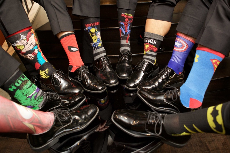 Superhero Socks for Groomsmen
Photography: Amanda Sudimack for Artisan Events
Read More:
http://www.insideweddings.com/weddings/customized-chicago-wedding-with-pink-blush-marsala-color-palette/911/ Groomsmen in dress shoes and slacks with superhero theme socks hulk spiderman superman batman more