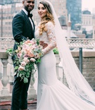 Bride and Groom on Rainy Day
Photography: Kesha Lambert Photography
Read More:
http://www.insideweddings.com/weddings/personalized-ceremony-with-pink-florals-at-a-loft-in-new-york-city/1210/ bride in pronovias mermaid wedding dress with lace bodice, groom in tuxedo