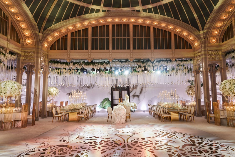 Library Wedding with White %26 Gold Décor
Photography: Christian Oth Studio
Read More:
http://www.insideweddings.com/weddings/traditional-cathedral-wedding-luxury-reception-in-new-york-city/1331/ flower print wall in back of reception gold dance floor hanging roses white gold accents new york