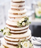 5-Tier Naked Cake with Fresh Flowers
Photography: Joe Laurin Photography
Read More:
http://www.insideweddings.com/weddings/simple-chic-seaside-wedding-with-white-palette-in-rhode-island/953/ 5 five tier naked cake fresh flowers delicious wedding desserts trendy confections