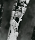 Lace wedding dress and long veil
Photography: Silvia Mautner Photography
Read More:
http://www.insideweddings.com/weddings/red-rose-inspired-backyard-wedding-in-california/42/ groom kisses bride wearing long sleeved lace wedding gown
