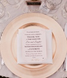 Thank-You Note
Photography: Jana Williams Photography
Read More:
http://www.insideweddings.com/weddings/ivory-gold-blush-lakefront-new-hampshire-wedding/412/ Rose gold charger plate with printed thank you note