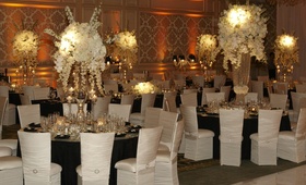 Regal Reception Décor
Photography: KingenSmith
Read More:
http://www.insideweddings.com/weddings/timeless-black-white-wedding-in-chicago-illinois/349/ Chameleon chairs around black wedding tables