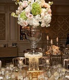 Tall Wedding Centerpiece with Pink Roses
Photography: KingenSmith
Read More:
http://www.insideweddings.com/weddings/elegant-wedding-with-blush-ivory-and-gold-palette-in-chicago/769/ Wedding arrangement of pink rose, white hydrangea, on top of glass vase
