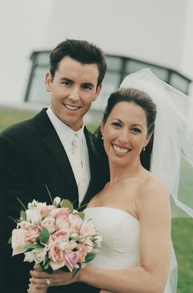California Wedding Couple
Photography: Annette Buhl
Read More:
http://www.insideweddings.com/weddings/janet-evans-and-bill-willson/79/ Groom with white tie and vest and bride with pink bouquet