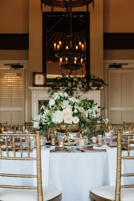 Wedding Reception In Room With Fireplace Chandelier Rustic Tall Mirror And Low Centerpiece Wedding Reception In Room With Fireplace Chandelier Rustic Tall Mirror And Low Centerpiece