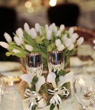 Wedding Party Table
Photography: Barber Photography
Read More:
http://www.insideweddings.com/weddings/bride-wears-custom-wedding-gown-at-the-resort-at-pelican-hill/66/ White table linens and centerpiece with silver goblets