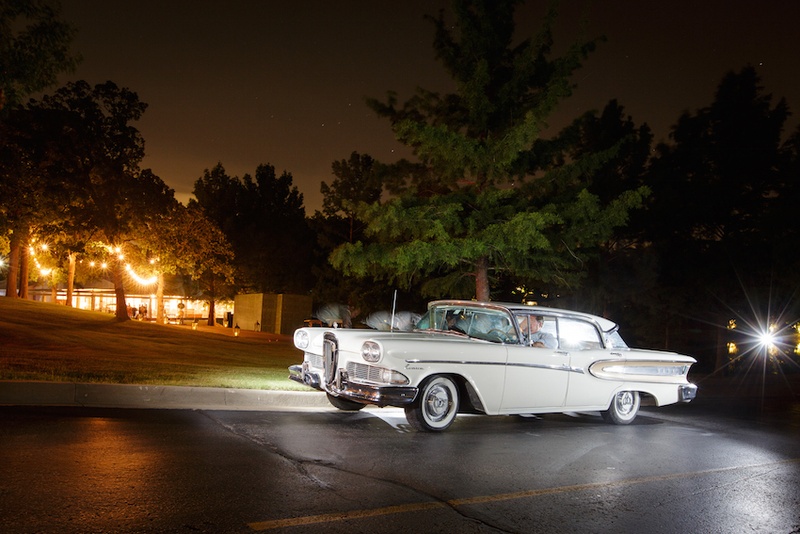 Classic White Car
Photography: Karlisch Studio
Read More:
http://www.insideweddings.com/weddings/southern-chic-wedding-in-oklahoma-with-performance-by-boyz-ii-men/697/ Classic white car parked at Southern Hills Country Club, Tulsa, OK