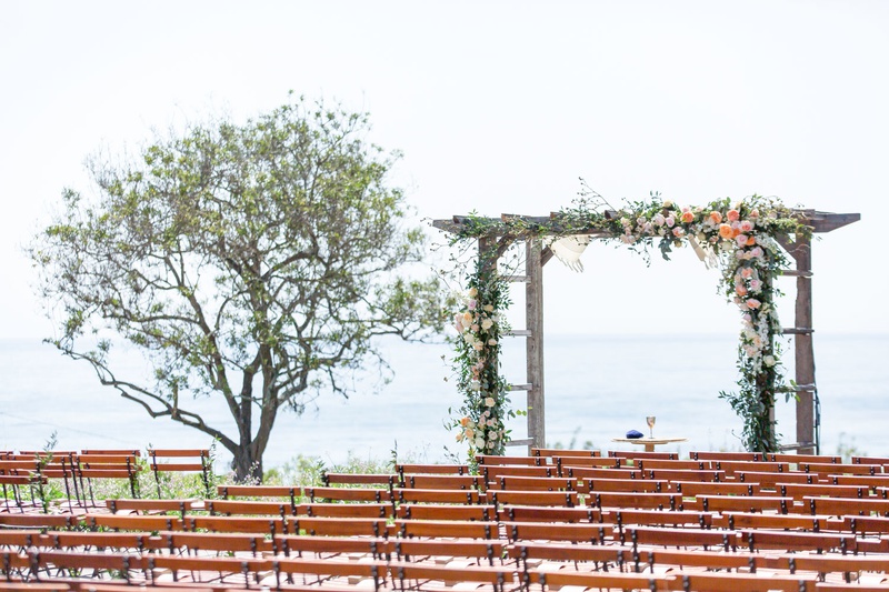 Ocean-View Ceremony on Bluff
Photography: Maya Myers Photography
Read More:
http://www.insideweddings.com/weddings/ocean-view-ceremony-rustic-chic-reception-in-former-greenhouse/1297/ wedding ceremony wood chairs wood arbor greenery rustic chic ocean view ceremony