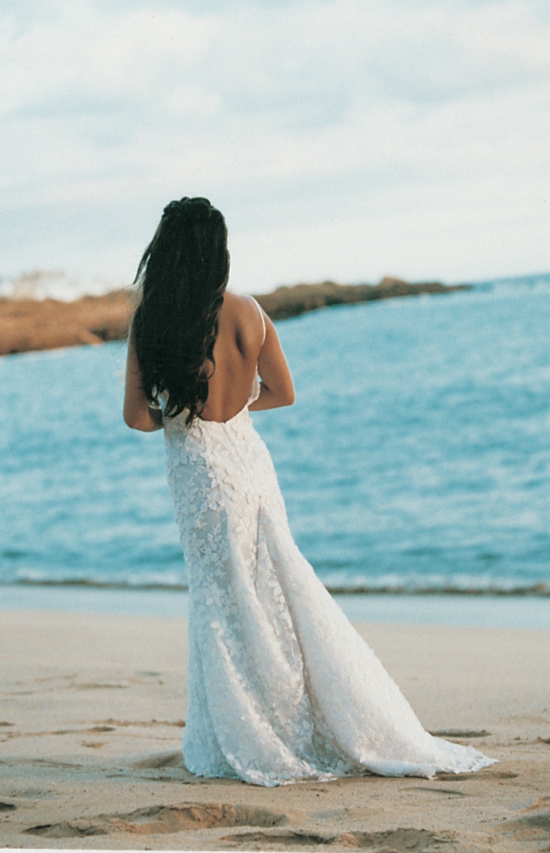 Low Back Wedding Dress
Photography: David Michael Photography
Read More:
http://www.insideweddings.com/weddings/tropical-seaside-wedding-in-lanai-hawaii/60/ rear view of wedding dress with lace skirt and low back