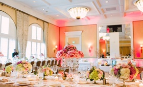 Crystal Candelabra Décor
Photography: Patrick Moyer
Read More:
http://www.insideweddings.com/weddings/vintage-inspired-alfresco-ceremony-fairy-tale-ballroom-reception/1030/ Ballroom reception crystal candelabra topped with pink roses and lower arrangements on long tables