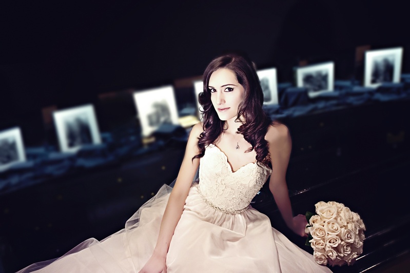 Bride Reclining with Slight Smile
Photography: Carasco Photography
Read More:
http://www.insideweddings.com/weddings/jewish-wedding-with-classic-ivory-and-gold-decor-in-chicago/983/ bride in essence of australia wedding dress reclines, smiles, holds bridal bouquet of ivory roses