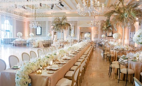 Ballroom Wedding with Luxe Tropical Theme
Photography: Jose Villa
Read More:
http://www.insideweddings.com/weddings/opulent-destination-wedding-with-luxe-tropical-decor-in-palm-beach/1158/ Wedding reception the breakers chandeliers palm trees gold from tables long table flower runner