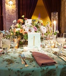 Vintage-Inspired Wedding Reception Table
Photography: Nathaniel Edmunds Photography
Read More:
http://www.insideweddings.com/weddings/church-ceremony-ballroom-soiree-inspired-by-the-streets-of-italy/1130/ Wedding reception vintage inspired light blue linen with embellishments embroidery pink napkin