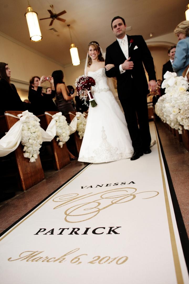 Bride Escorted Down the Aisle
Photography: Josh Lynn Photography
Read More:
http://www.insideweddings.com/weddings/purple-white-gold-new-jersey-celebration/339/ Bride in a strapless A-line gown is walked down the aisle by her father isn a black tuxedo