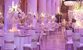 Elegant Houston Reception
Photography: Michael Carr Photography
Read More:
http://www.insideweddings.com/weddings/exceptional-wedding-event-in-historical-houston-building/468/ Marble column wedding venue with white and gold decorations