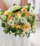 Peach %26 Lemon Bridal Bouquet
Photography: Josephine Photography
Read More:
http://www.insideweddings.com/weddings/traditional-jewish-ceremony-romantic-yellow-reception-in-nyc/1036/ Wedding bouquet with white flowers, light orange roses, yellow blooms and greenery colorful