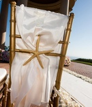 Starfish Chair Decorations
Photography: Barber Photography
Read More:
http://www.insideweddings.com/weddings/pink-white-summer-wedding-at-the-resort-at-pelican-hill/314/ Ocean-inspired ceremony chairs in gold