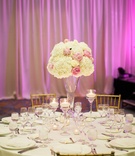Ivory Florals with Pink Accents
Photography: Brooke Images
Read More:
http://www.insideweddings.com/weddings/oceanfront-ceremony-classic-ballroom-reception-in-florida/936/ pink peonies, white roses, white hydrangeas centerpieces on glass stand