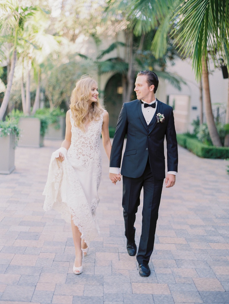 Bride %26 Groom Strolling Vibiana's Courtyard
Photography: Steve Torres Photography
Read More:
http://www.insideweddings.com/weddings/romantic-inspirational-shoot-at-a-historic-venue-in-downtown-la/724/ Bride in "Carla" from JINZA Couture Bridal 2016 Collection, groom in tux, Vibiana's garden