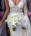 Bridal and Bridesmaid Bouqets
Photography: Kesha Lambert Photography
Read More:
http://www.insideweddings.com/weddings/romantic-wedding-with-vibrant-purple-decor-and-caribbean-traditions/1138/ bridal bouquet with Phalaenopsis orchids and calla lilies, shades of purple roses bridesmaid bouquet