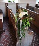Church Pew Decoration
Photography: Donna von Bruening Photographers
Read More:
http://www.insideweddings.com/weddings/wedding-planner-genina-ramirezs-southern-celebration/367/ White chrysanthemum with green leaves on wood pew
