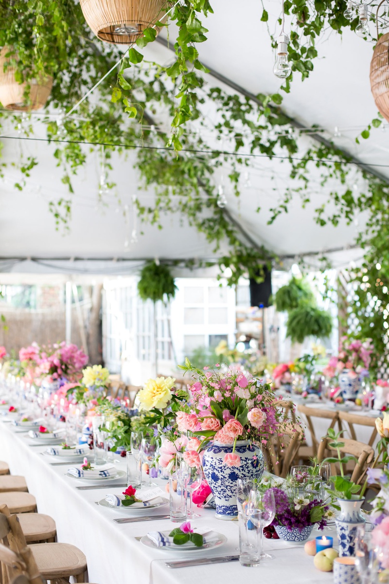 Colorful Flowers on Long Tables
Photography: Maya Myers Photography
Read More:
http://www.insideweddings.com/weddings/colorful-tented-rehearsal-dinner-with-garden-elements-in-brooklyn/1188/ chinoiserie vases, pink and yellow flowers, king's table for tented rehearsal dinner with flowers