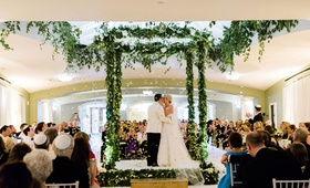 Gold Confetti at Indoor Wedding Ceremony
Photography: Liz Banfield
Read More:
http://www.insideweddings.com/weddings/sophisticated-playful-southern-jewish-wedding-in-charleston/1076/ Wedding ceremony jewish service chuppah greenery garland gold step and guests tossing gold confetti