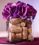 Wine Cork Centerpiece
Photography: Jason + Gina Wedding Photographers
Read More:
http://www.insideweddings.com/weddings/vineyard-inspired-wedding-at-four-seasons-denver-colorado/453/ Cocktail hour centerpieces with corks and flowers