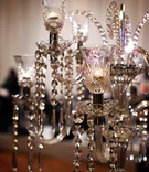 Crystal Chandelier
Photography: Bob %26 Dawn Davis Photography
Read More:
http://www.insideweddings.com/weddings/chic-black-white-summer-wedding-in-chicago-illinois/369/ Elegant light fixture embellished with crystals