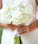 All-White Bouquet
Photography: Walters %26 Walters
Read More:
http://www.insideweddings.com/weddings/classic-country-club-wedding-in-north-carolina/423/ White flowers tied with ribbon and pendant