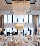 Silver, Grey %26 Ivory City Reception
Photography: Studio This Is
Read More:
http://www.insideweddings.com/weddings/glamorous-city-style-real-wedding-at-a-luxury-hotel-in-chicago/1217/ wedding reception ballroom view of chicago chandelier white flower arrangements light grey linen