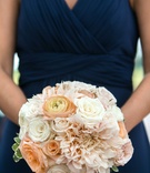 White, Apricot %26 Pink Bridesmaid Bouquet
Photography: Arte De Vie
Read More:
http://www.insideweddings.com/weddings/traditional-church-ceremony-country-club-reception-in-new-orleans/719/ Bridesmaid in a sleeveless navy dress holds bouquet of white roses, peach ranunculuses, roses, pink