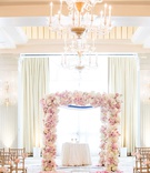 Pink %26 Ivory Chuppah with Chandeliers
Photography: Maya Myers Photography
Read More:
http://www.insideweddings.com/weddings/ballroom-wedding-at-an-ocean-view-hotel-in-santa-monica-california/1325/ wedding ceremony casa del mar ivory drapery chandelier pink rose petals lining aisle chuppah gold