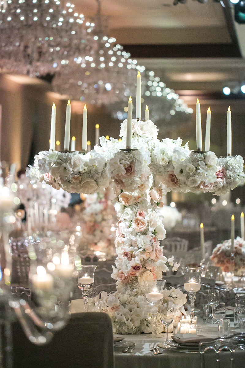 Floral-Wrapped Candelabrum
Photography: Jessica Claire Photography
Read More:
http://www.insideweddings.com/weddings/traditional-armenian-ceremony-luxurious-ballroom-reception/1006/ fake candles, candelabra covered with white and blush roses