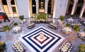 Aerial View of Museum Reception
Photography: Averyhouse
Read More:
http://www.insideweddings.com/weddings/chic-summer-wedding-at-a-natural-history-museum-in-chicago/1361/ wedding reception at the field museum in chicago navy white stripe dance floor cake in center